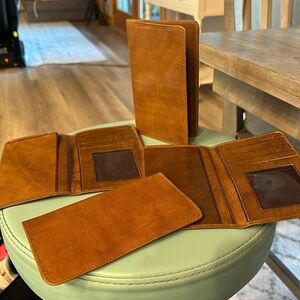 Brown leather long bifold wallet, card spaces, check space, price  is fo…